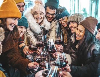 friends holding wine glasses