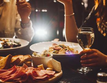 people at a nice restaurant for dinner