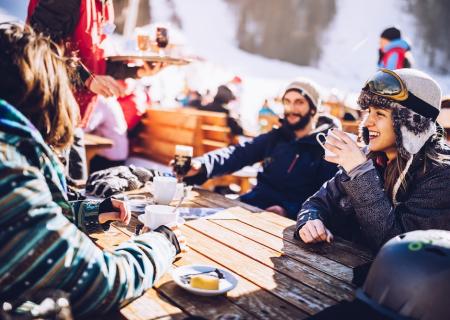 dining with friends in a ski town