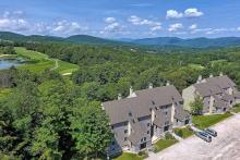 aerial view of Wiffletree condo complex in killington, vt showing golf course in background