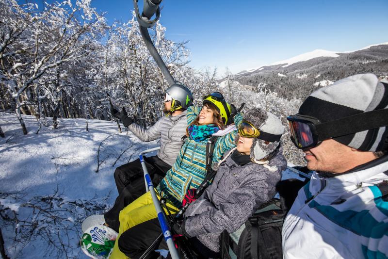 friends on ski lift