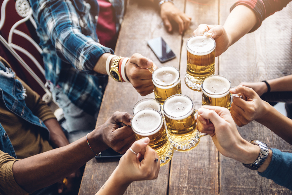 friends toasting with beer glasses