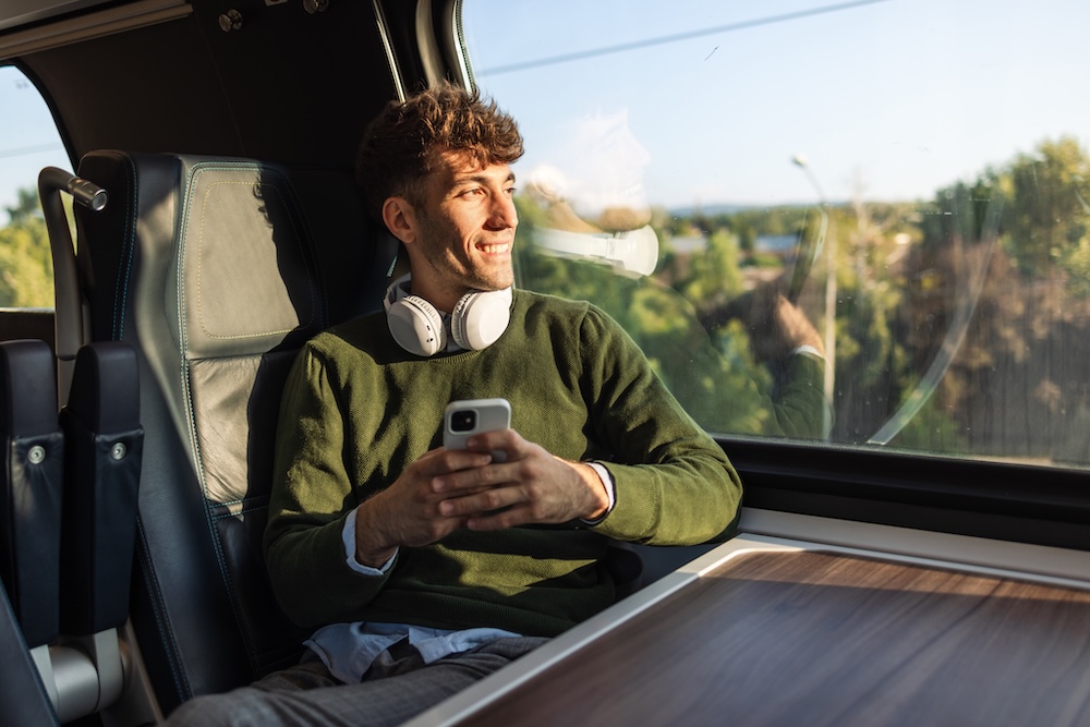 man riding train