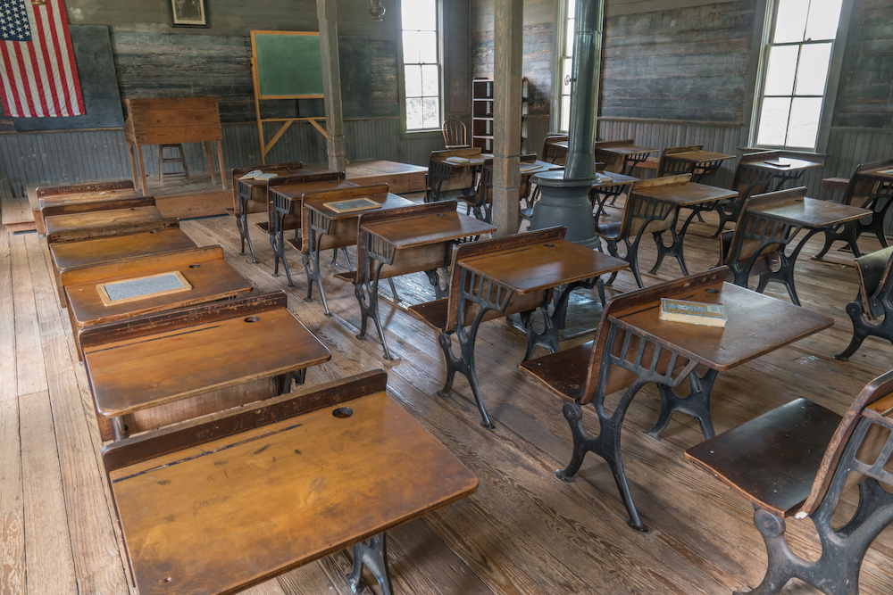 interior classroom and desks of old one-room schoolhouse